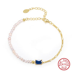 Pulsera Figaro con Perlas y Cristal Azul